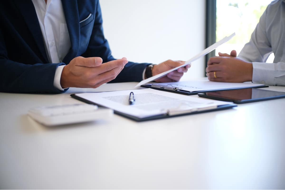 Man reviewing a document - Performing a Cosmetics Label and Claims Check Report