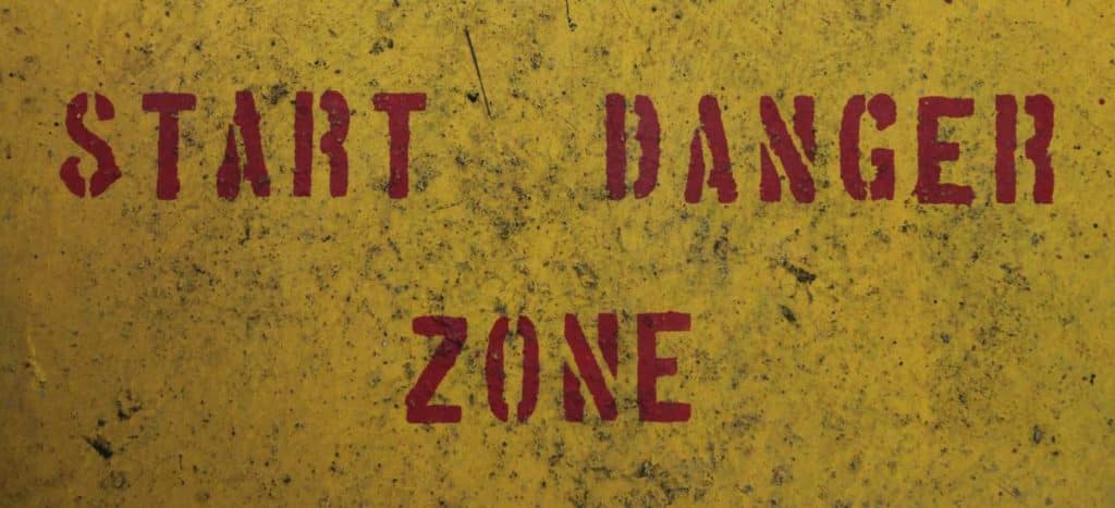 A yellow sign with the words start danger zone on it-endocrine disruptors